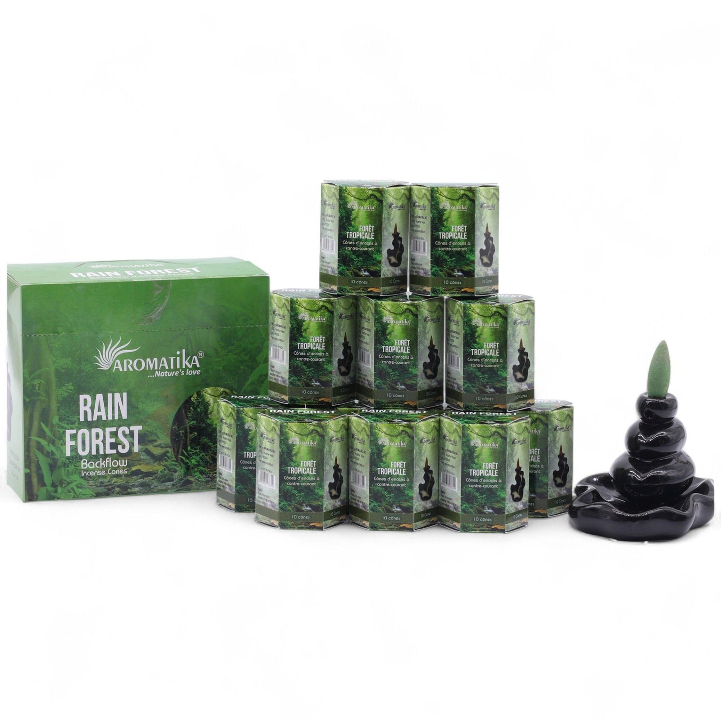 Pack of ten hand-rolled masala backflow incense cones beside a hexagon box with lush rain forest imagery.