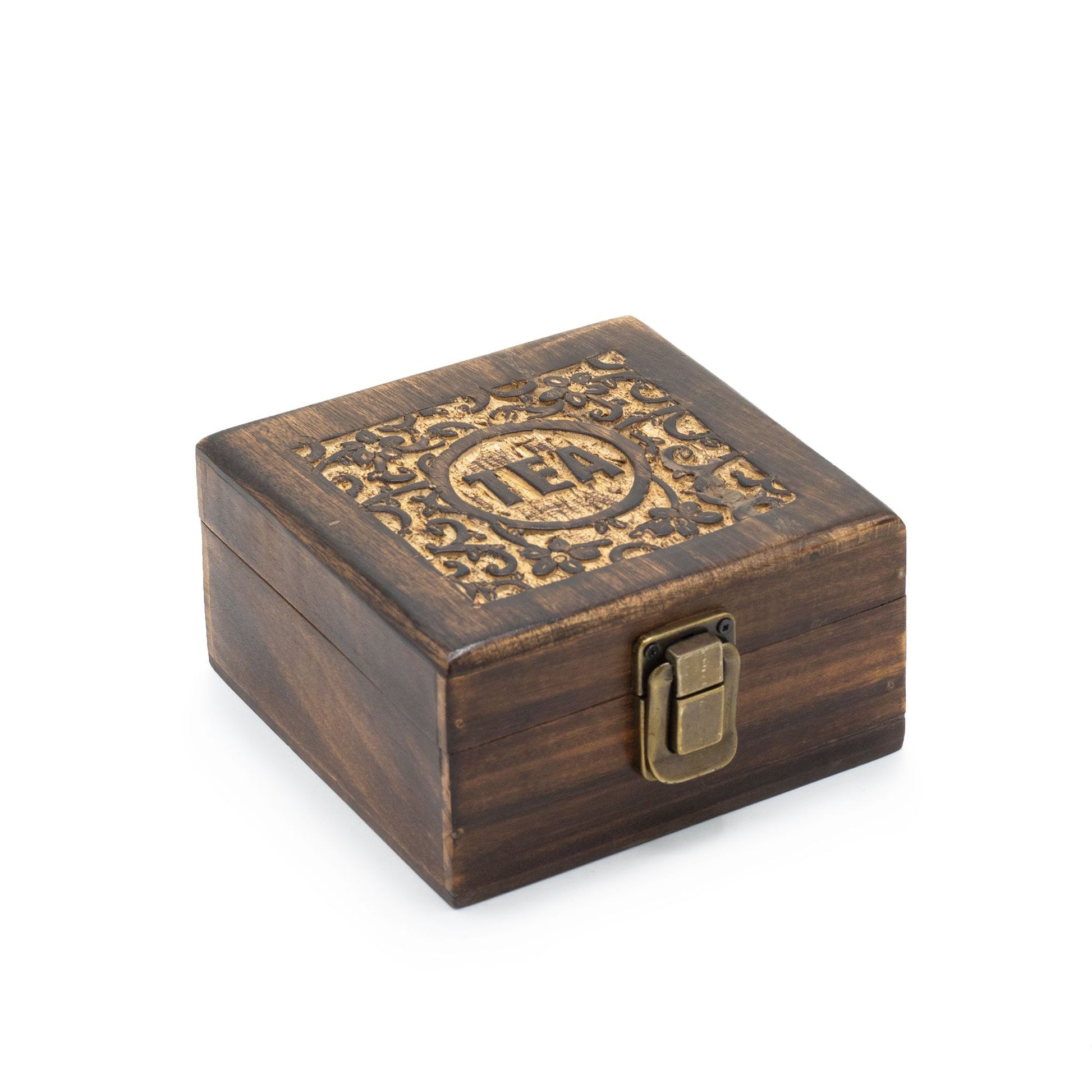 Handcrafted mango wood tea storage box with decorative floral carvings on the lid and four internal compartments.