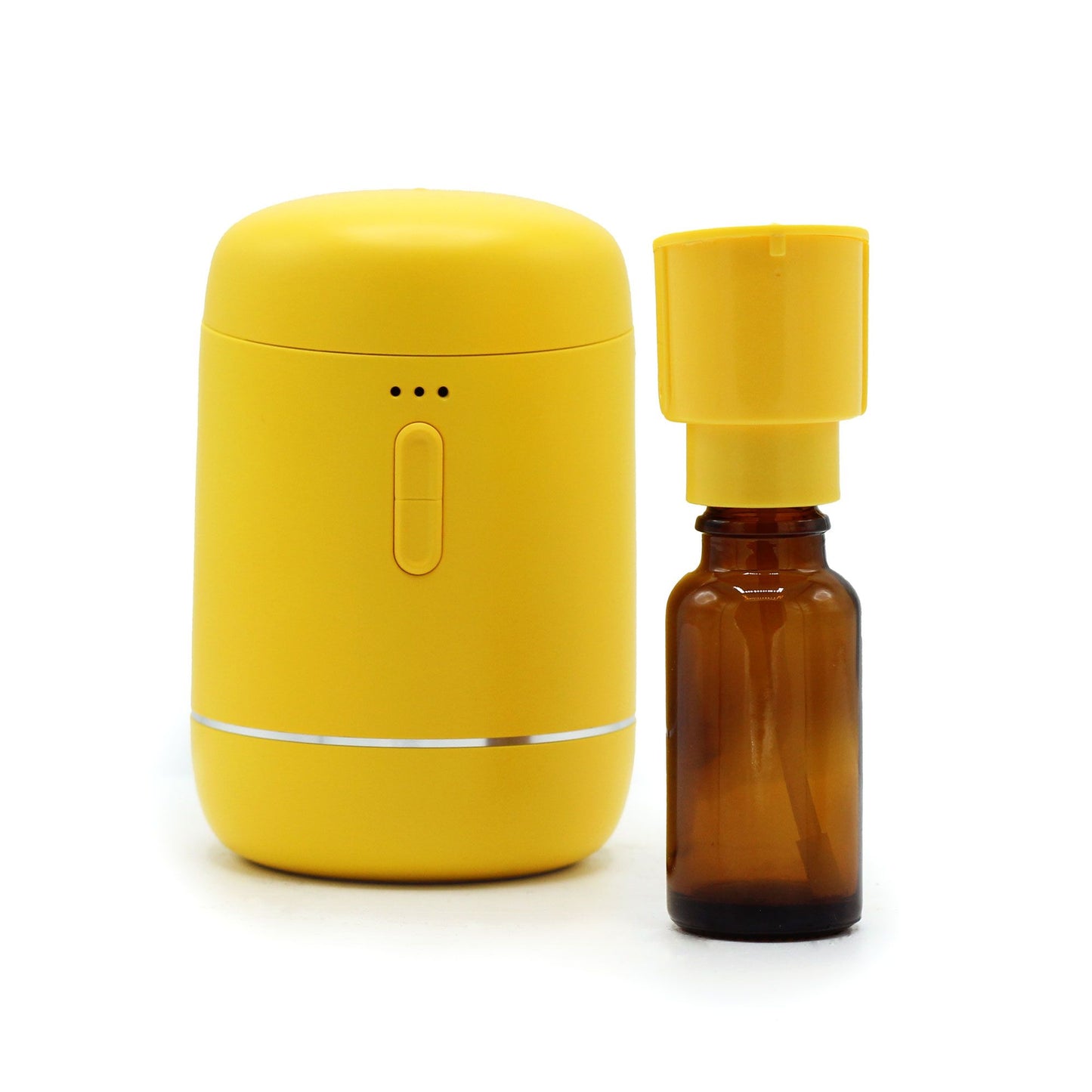 Compact yellow rechargeable waterless essential oil nebuliser with USB-C port and power indicator light.