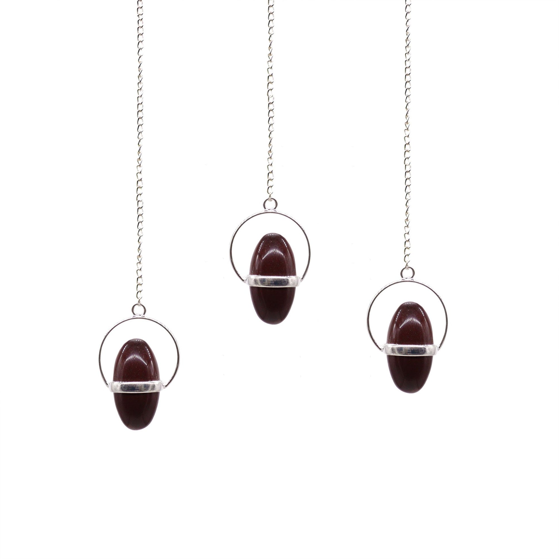 Smooth egg-shaped Shiva Lingam stone with natural brown markings held in a decorative silver-toned metal band and chain.