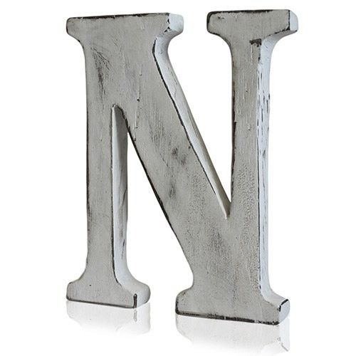 Hand-carved mango wood letter N with a rustic white-wash finish and natural grain details.