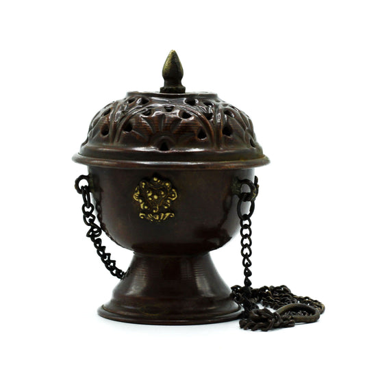 Handcrafted copper hanging incense burner with intricate traditional designs and a hanging chain and hook.