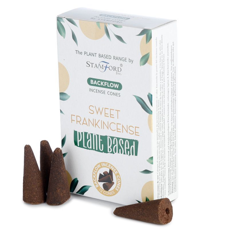 Several dark brown conical incense cones designed for backflow burners, resting on a flat surface.