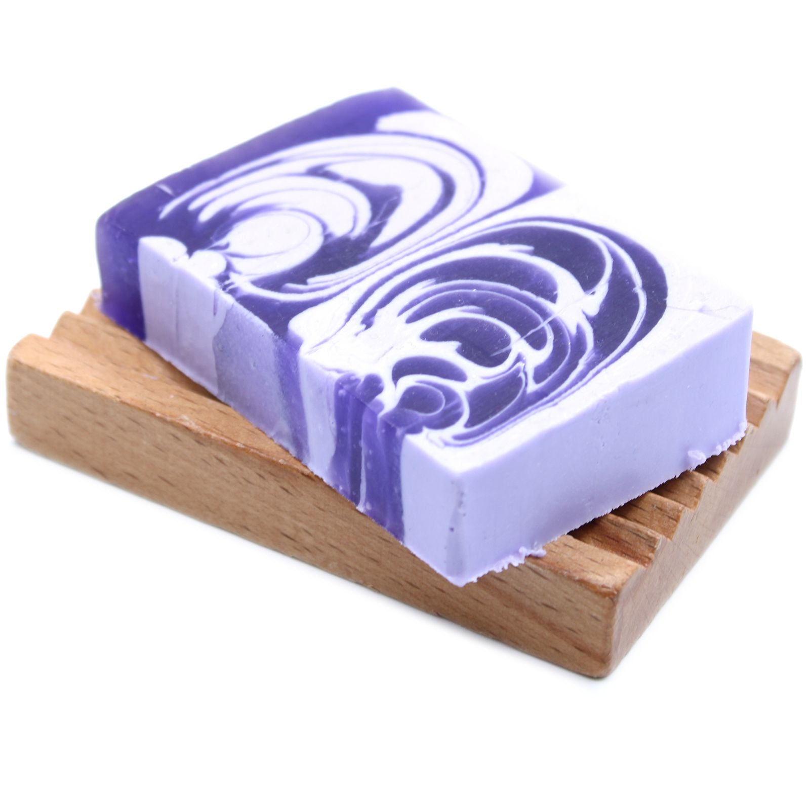 A 100g slice of artisanal handcrafted soap featuring a delicate lilac colour and textured top.