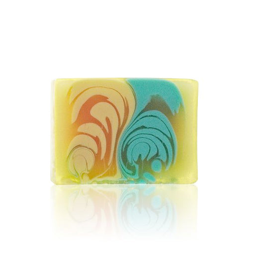 Handcrafted soap slice with a vibrant green melon colour and creamy textured layers.