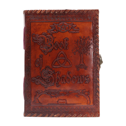 Large dark tan vintage style leather notebook with textured deckle-edged pages and a classic wrap-around closure.
