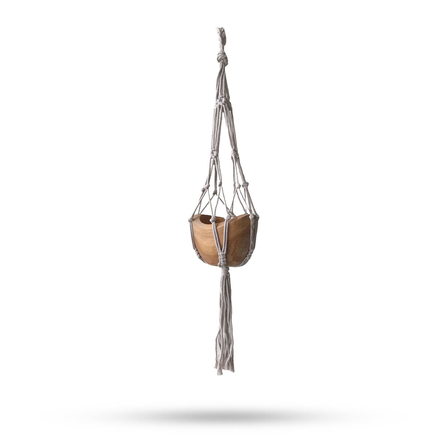 Small beige handcrafted macrame plant hanger with a teardrop design and decorative tassel.