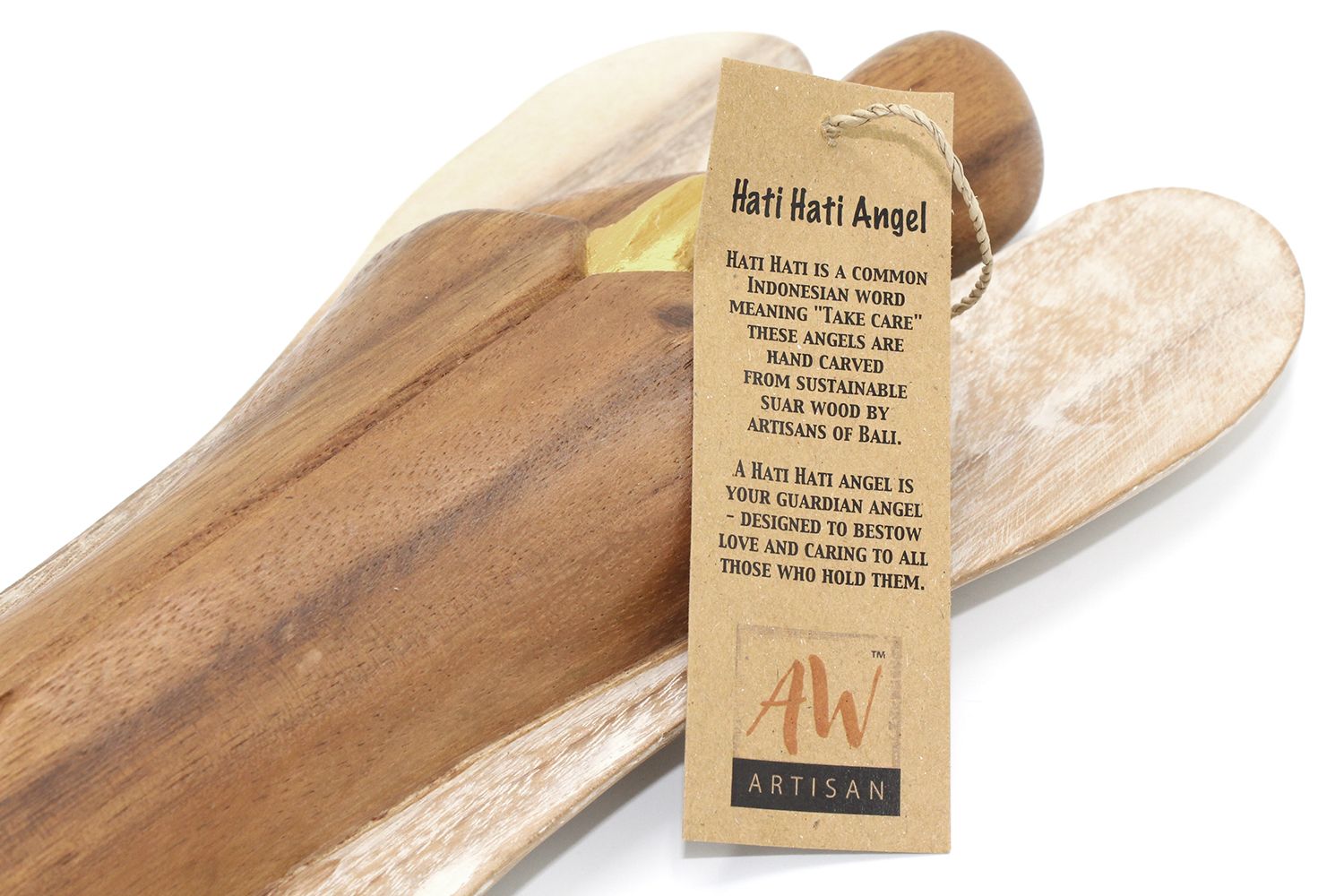 Small hand-carved wooden angel statue with hands held to the heart, representing love and compassion.