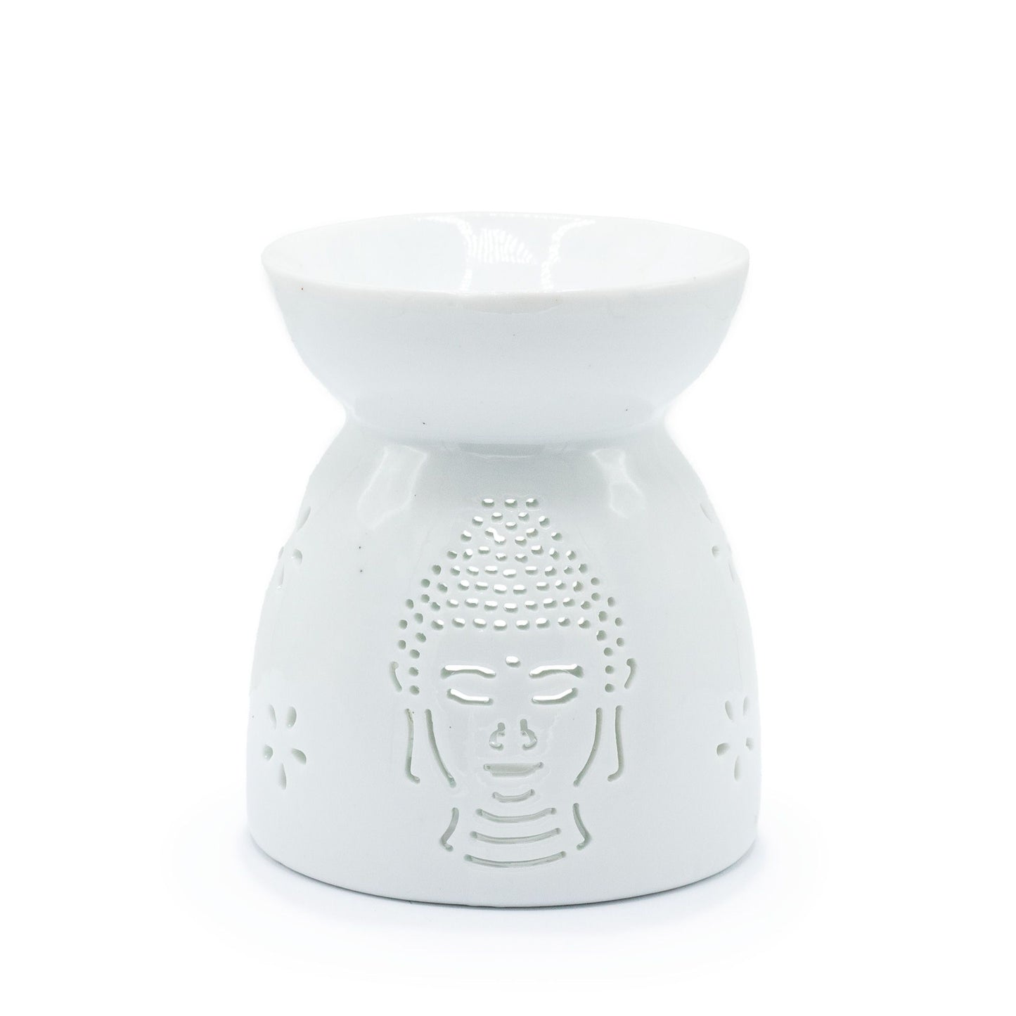 Elegant white ceramic oil burner featuring a serene Buddha face silhouette with decorative cut-out details.