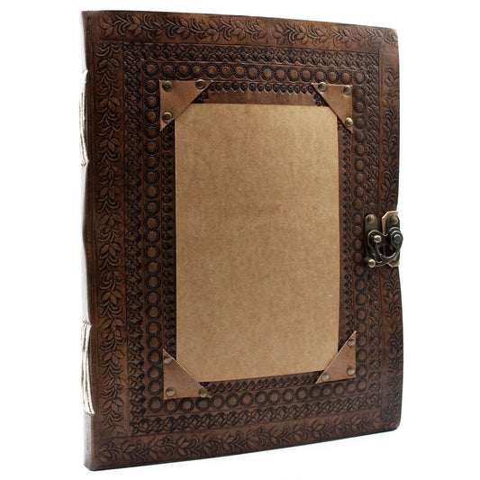 Large handcrafted vintage-style leather visitor book with a textured cover and wrap-around cord closure.