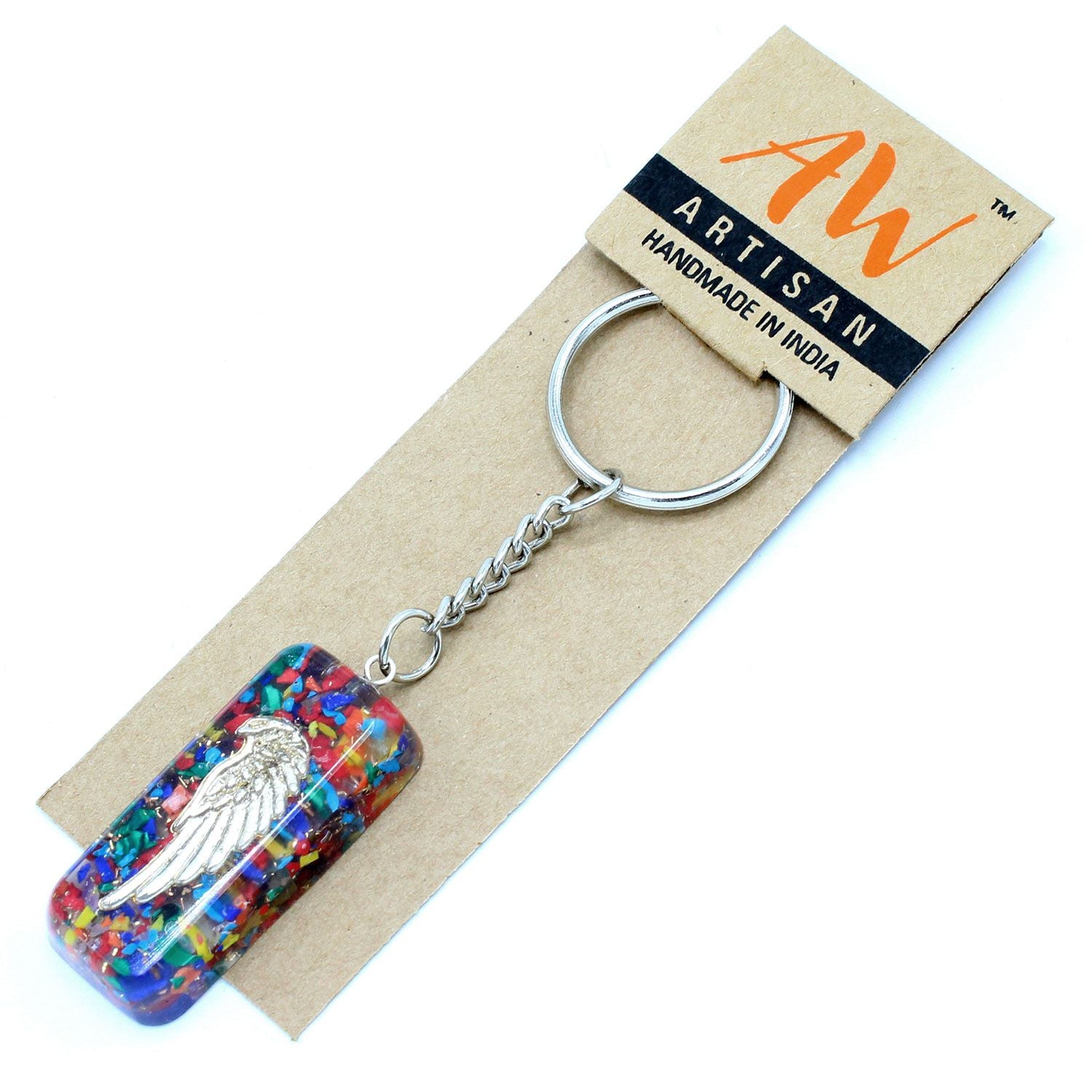 Circular orgonite keyring featuring protective crystals and a copper coil encased in clear resin on a silver-tone chain.