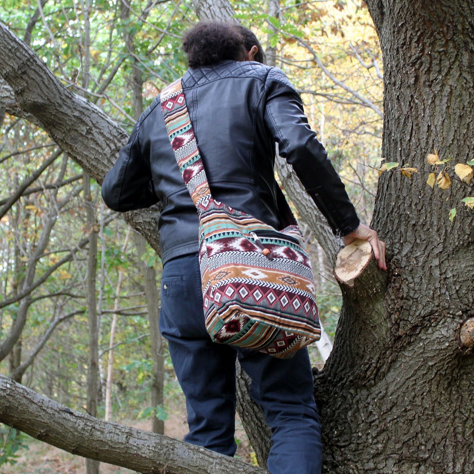 Backpack made from ethnic chocolate brown jacquard fabric with a traditional woven pattern and adjustable straps.