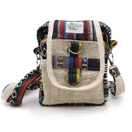 Natural hemp cross-body travel bag with intricate Jhari woven patterns and a durable shoulder strap.