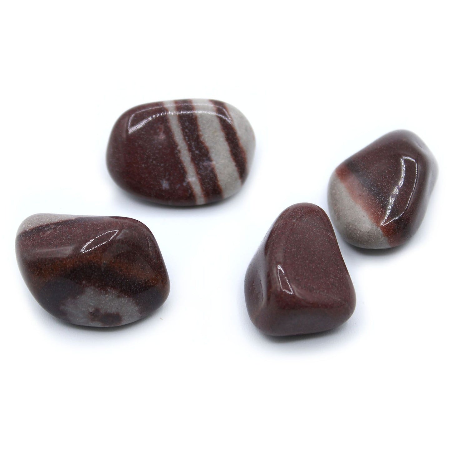 A smooth, highly polished Lingam tumble stone featuring natural earthy tones and a pleasing rounded shape.