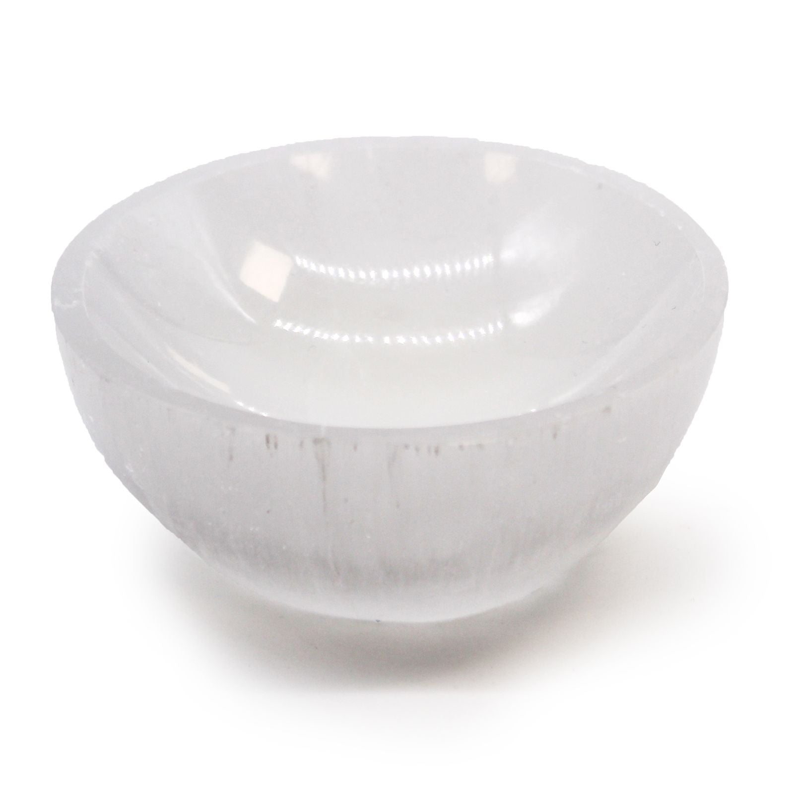 Small polished translucent white selenite bowl with a smooth round shape and natural crystalline texture.