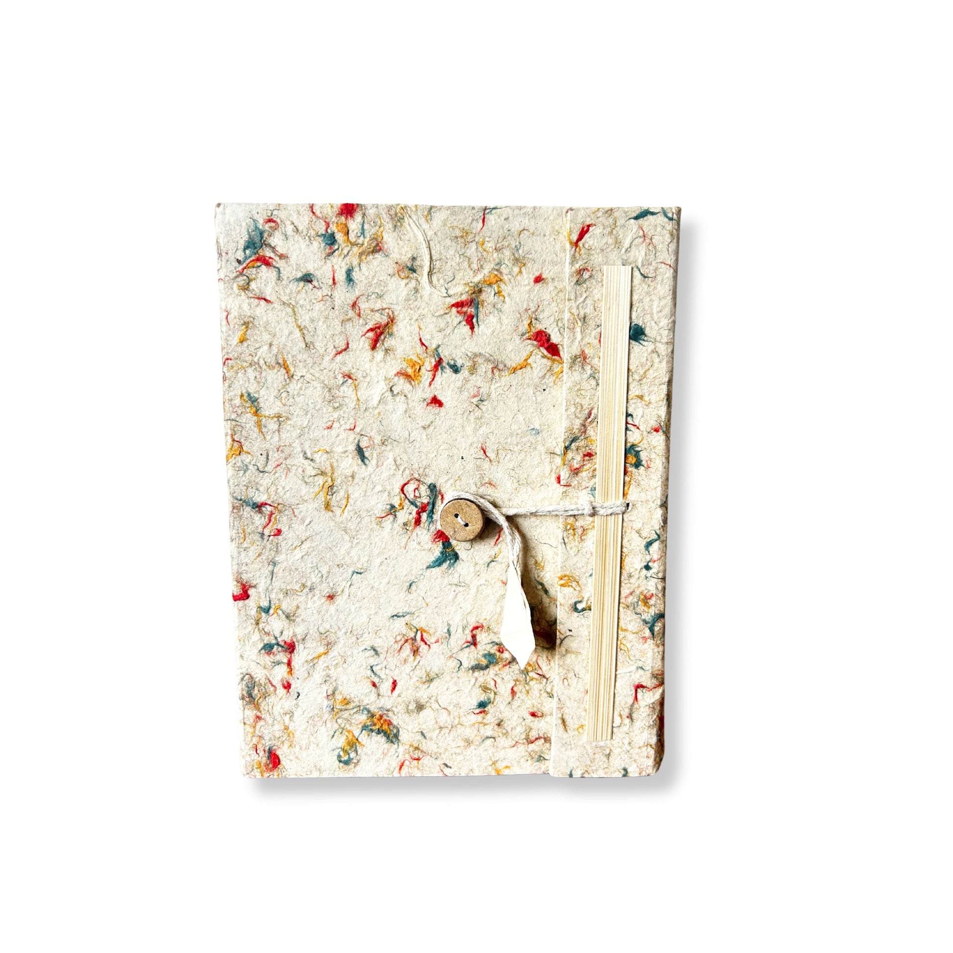 Handmade medium Lokta paper notebook with a natural patterned cover and mixed coloured cotton fibres.