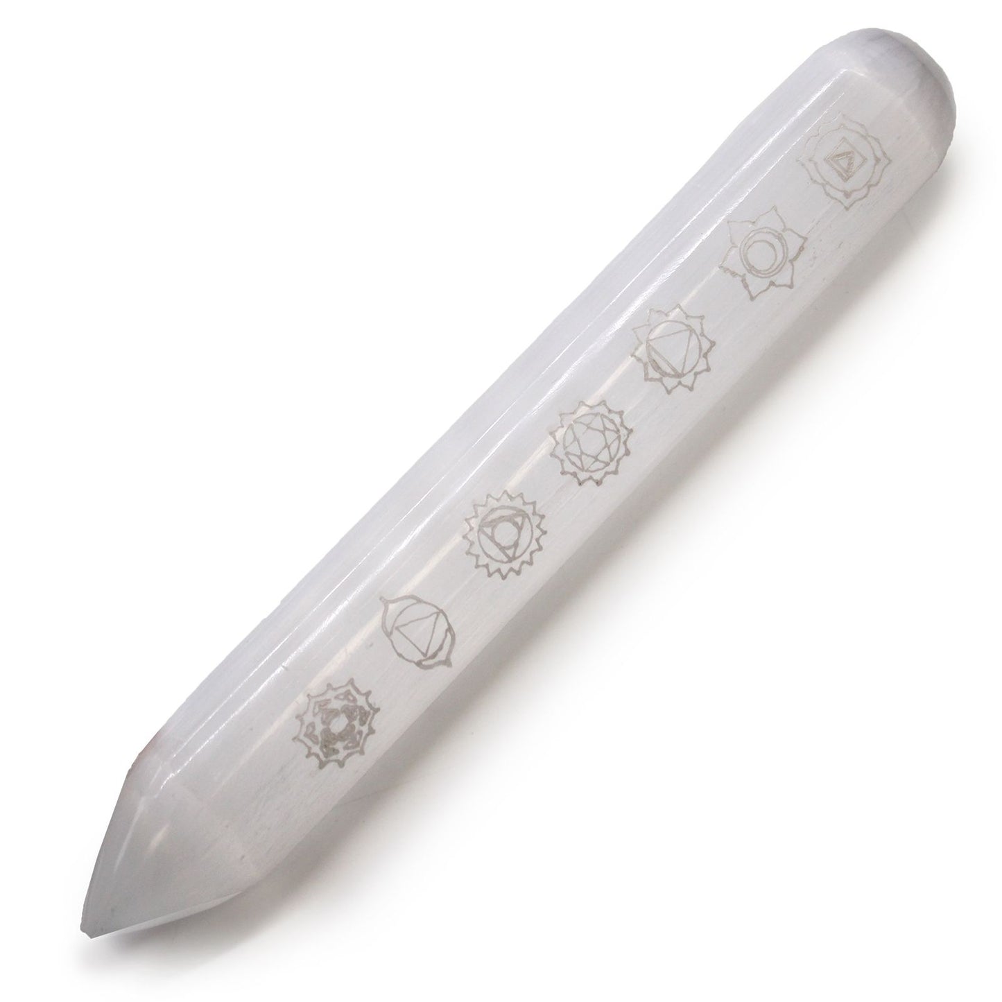 White selenite wand with seven colourful chakra stones and a pointed end on a neutral background.