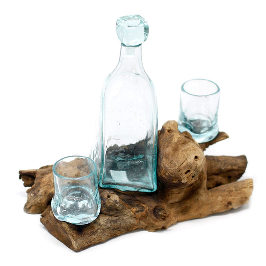Handcrafted whisky glasses uniquely molded over a natural reclaimed wood base with a molten glass effect.