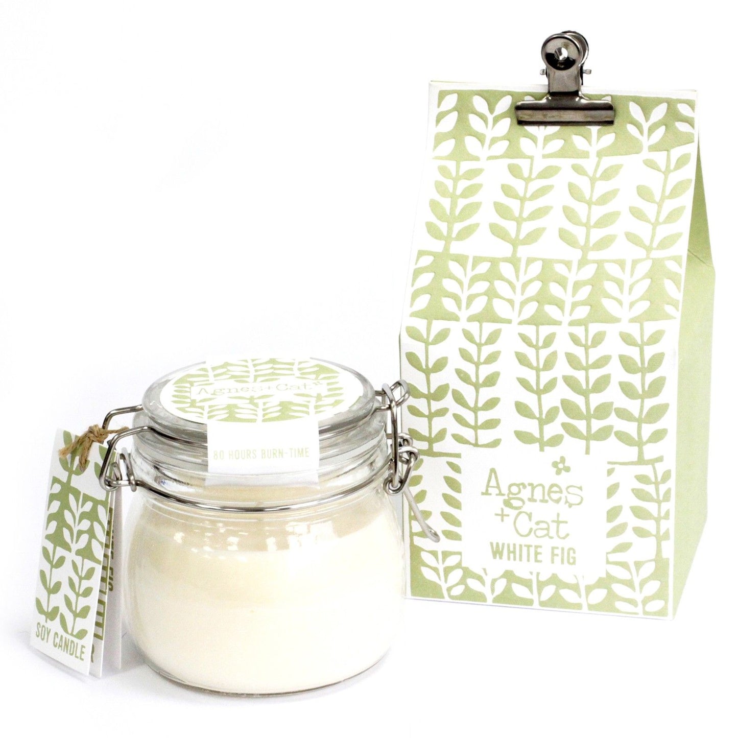Large glass kilner jar candle filled with white soy wax and a single wick, showing a minimalist rustic aesthetic.