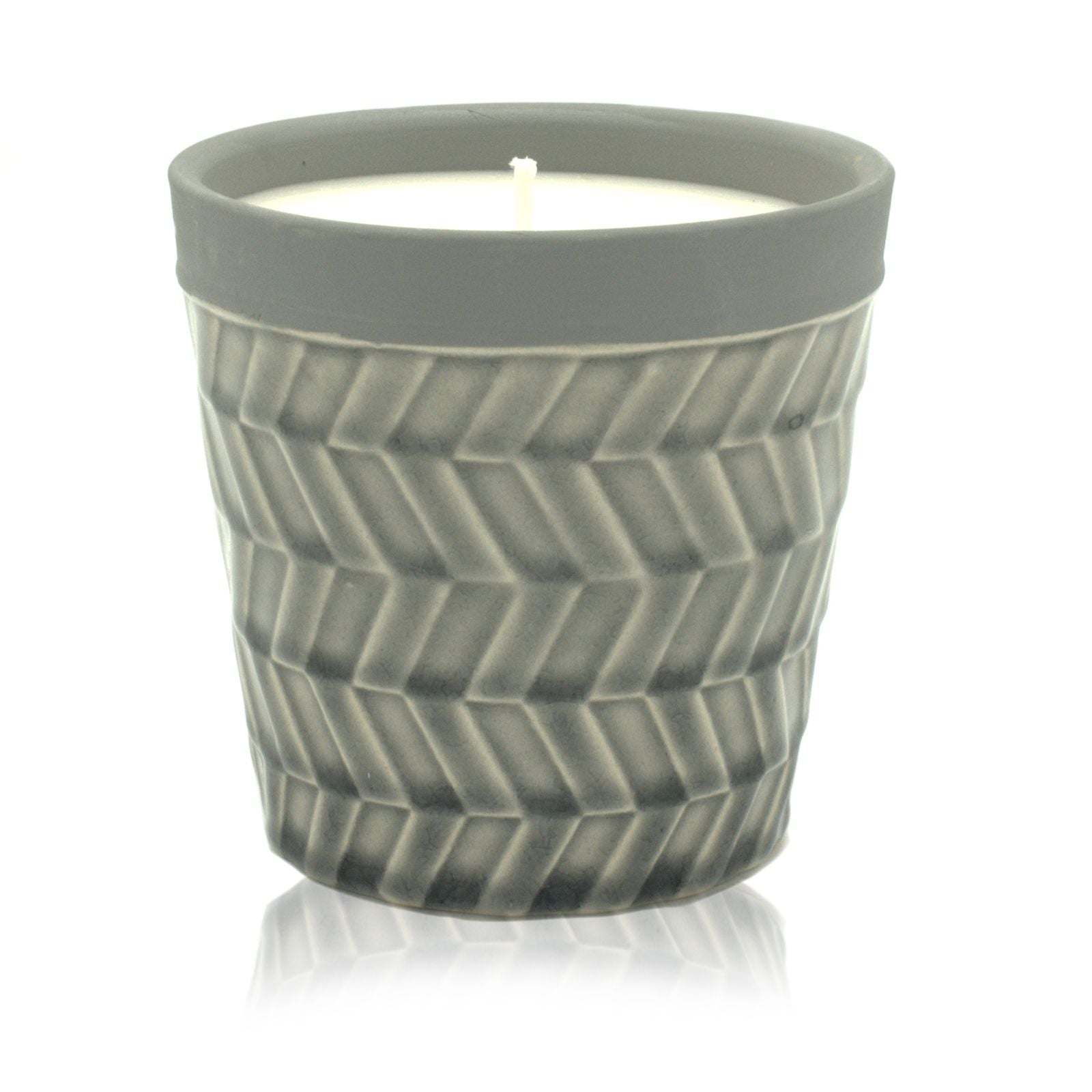 Large cream-coloured ceramic candle pot with a minimalist label and natural soy wax surface.