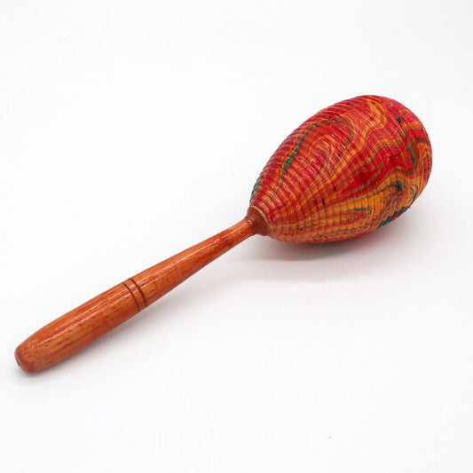 Handcrafted single rattan maraca rattle with a natural woven texture and smooth wooden handle.