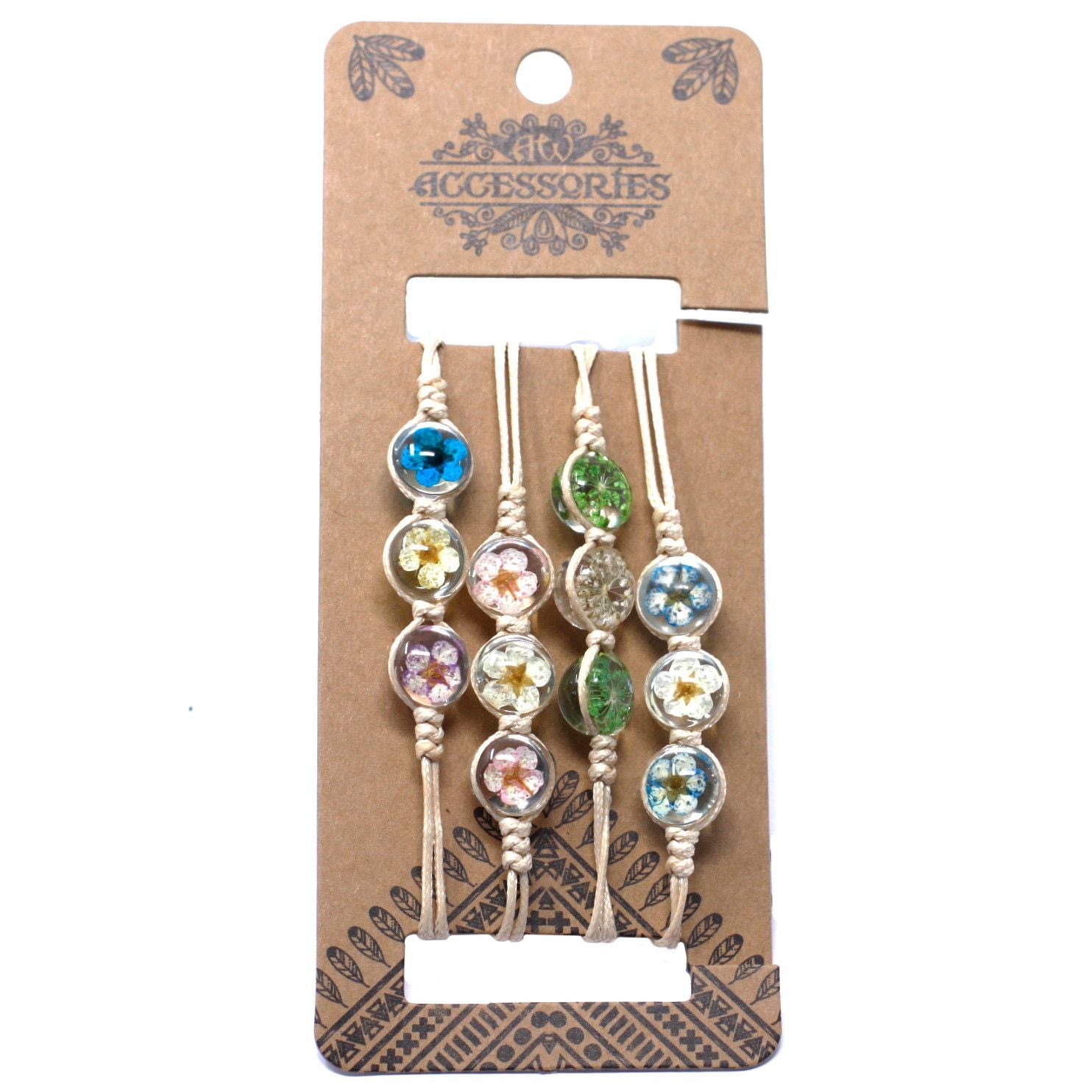 Delicate silver-toned bracelet featuring three circular glass charms with real colourful pressed flowers inside.