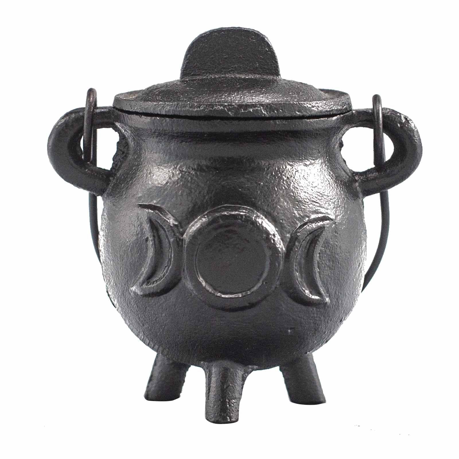 Small black cast iron ritual cauldron featuring an embossed triple moon symbol on three sturdy legs.