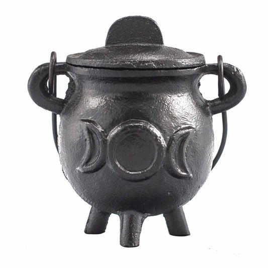 Small black cast iron ritual cauldron featuring an embossed triple moon symbol on three sturdy legs.