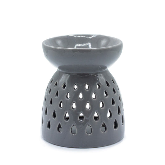 Grey ceramic oil burner with decorative teardrop-shaped cutouts and a gloss finish.