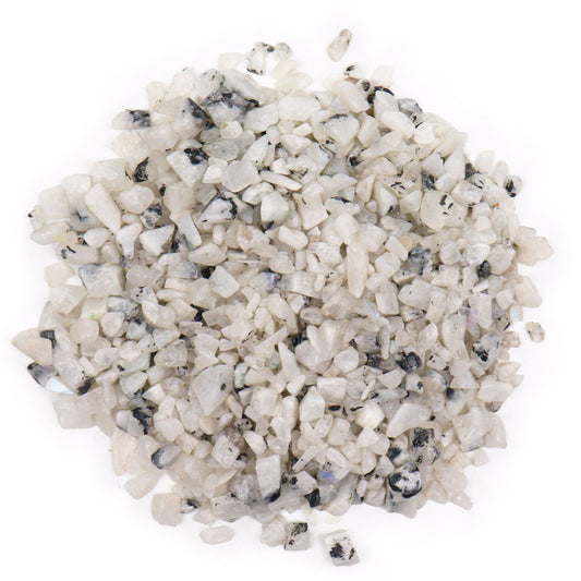 Large collection of polished rainbow moonstone gemstone chips showing varied sizes and shimmering white tones.