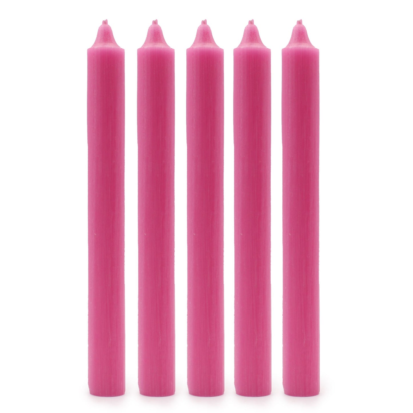 Five tall hand-drawn dinner candles in a rustic deep pink shade arranged together.