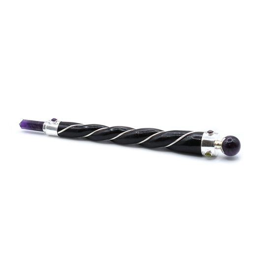 Silver-tone metal healing wand with a twisted design topped with a purple polished Amethyst crystal sphere.