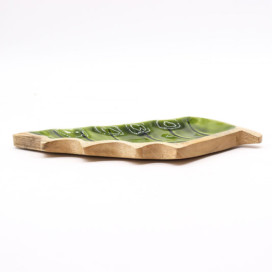Elegant leaf-shaped bowl made from natural mango wood with a glossy green enamel interior finish.