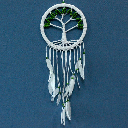 Intricate white macrame dreamcatcher featuring a central Tree of Life design and long flowing cotton tassels.