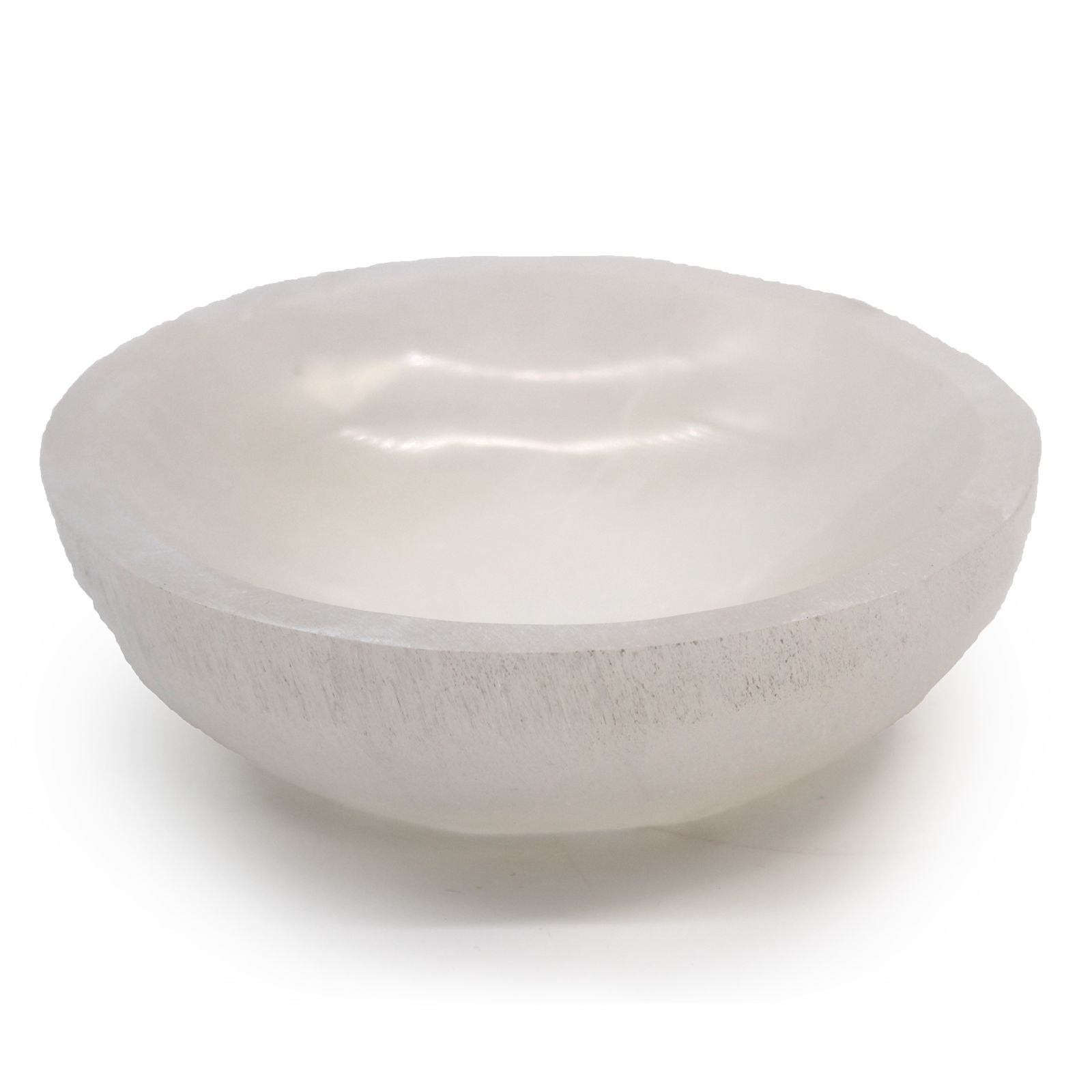 Large smooth white selenite crystal bowl with a polished finish and natural translucent glow.