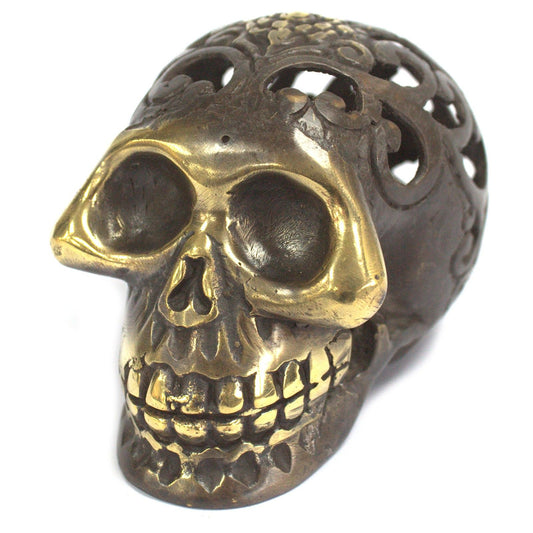 Detailed vintage-style brass skull ornament with an elegant metallic finish and intricate facial features.