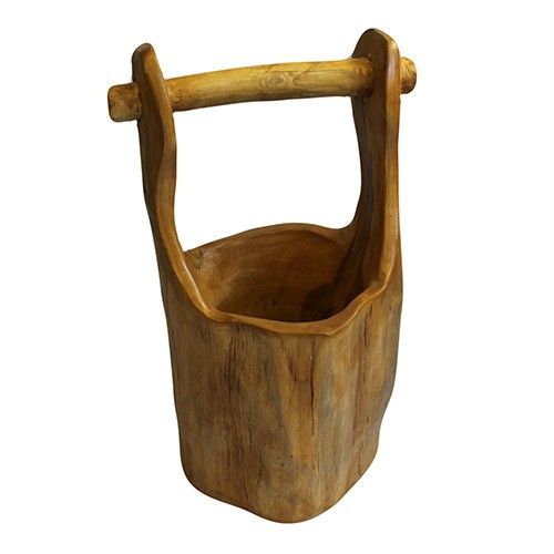 Hand-carved rustic teak root bucket with a natural wood grain and a sturdy handle for a unique decorative display.