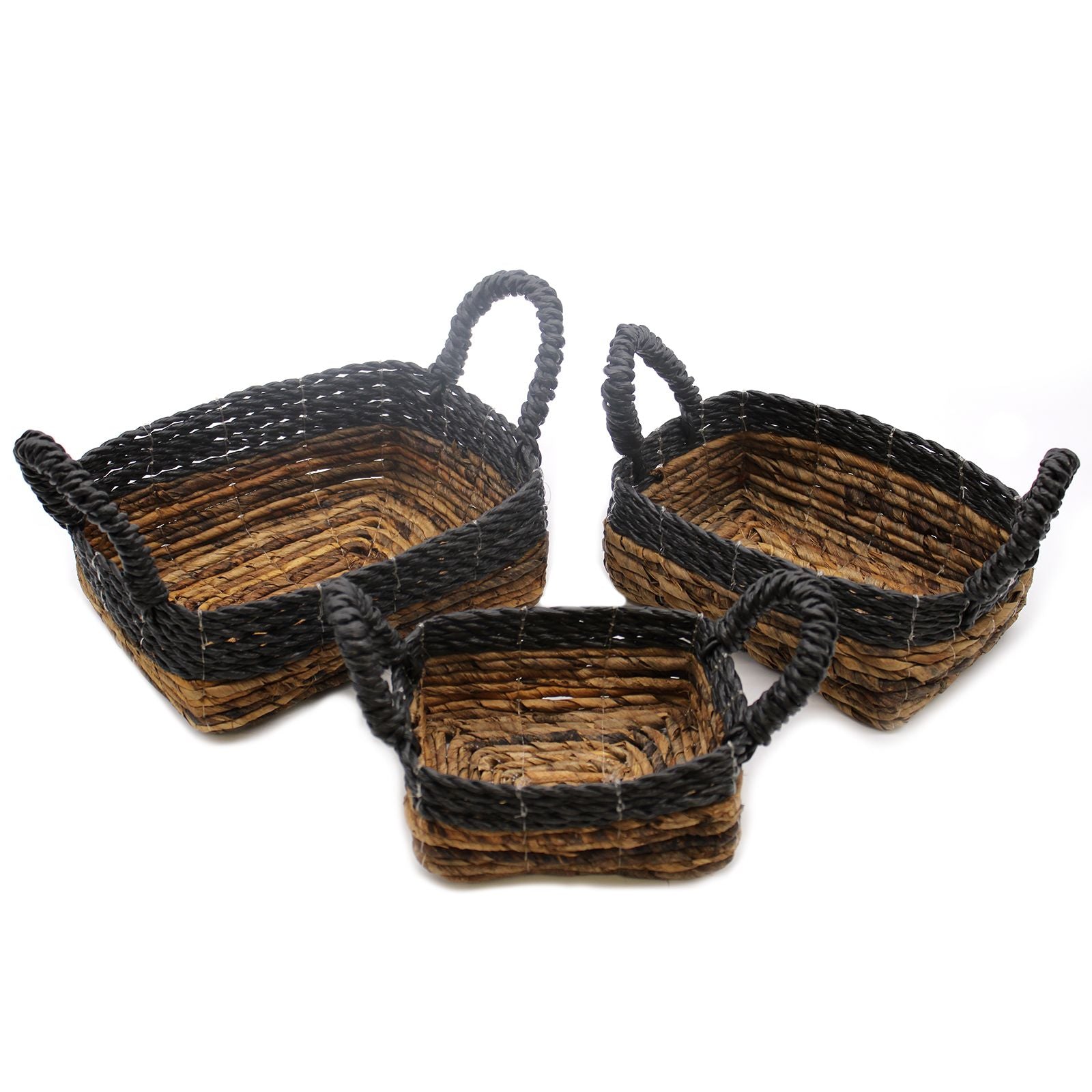 Set of three square nesting baskets made from woven banana leaf and dark hitam raffia with a natural textured finish.