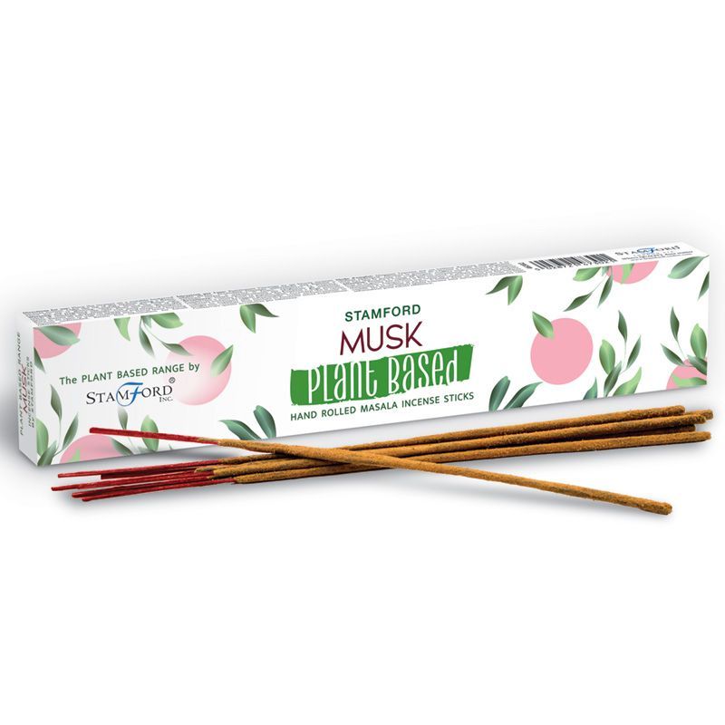 A bundle of natural brown masala incense sticks with a rich musk aroma in a minimalist setting.