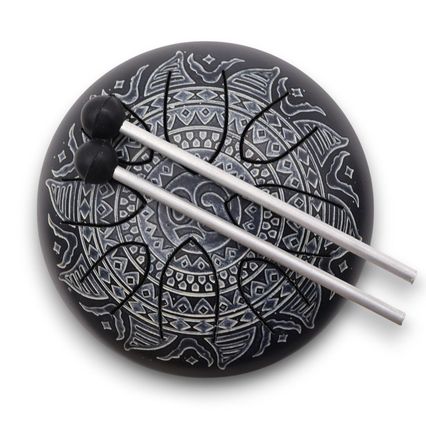 A circular 16cm steel tongue drum featuring an intricate engraved Om mandala design on a dark metallic surface.