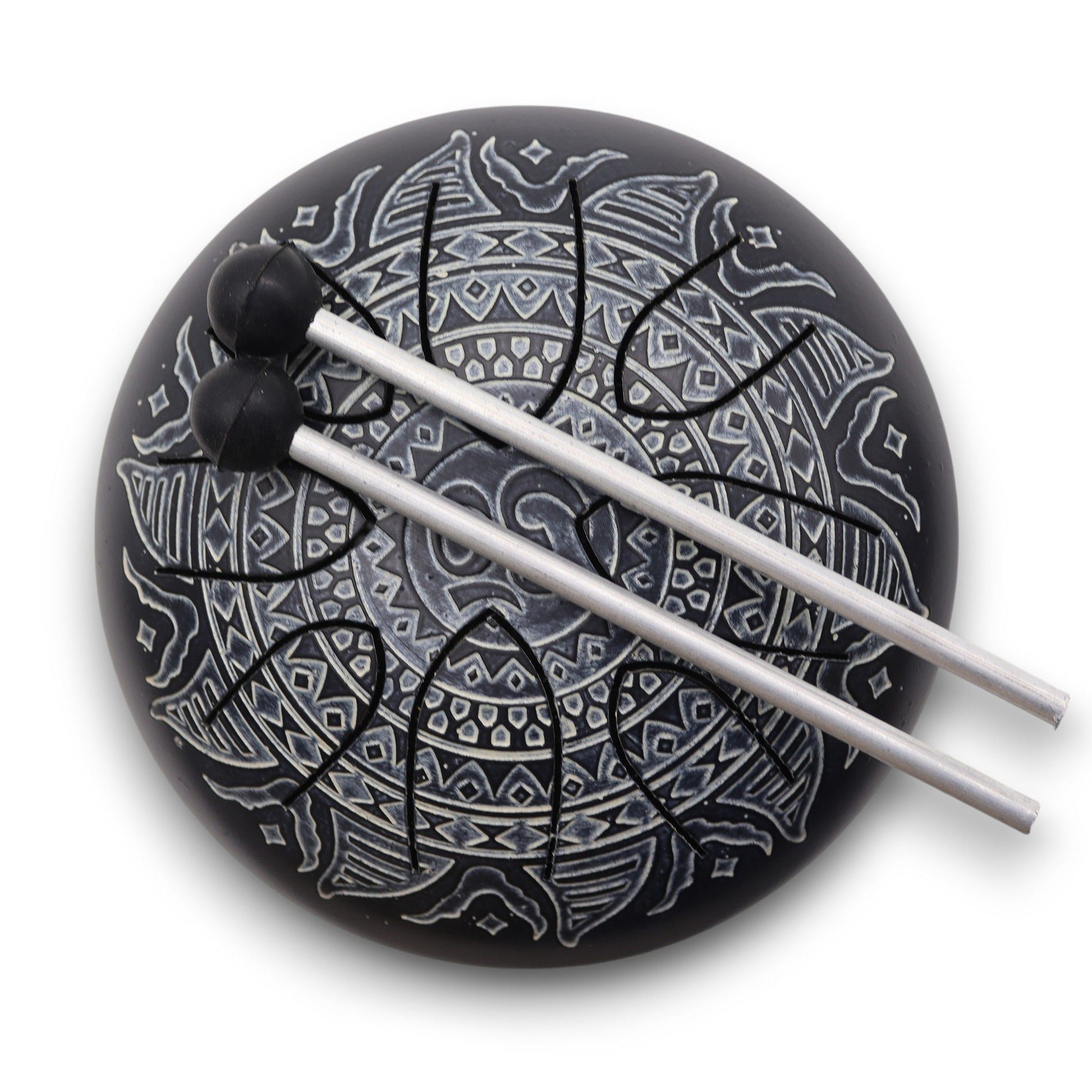 A circular 16cm steel tongue drum featuring an intricate engraved Om mandala design on a dark metallic surface.