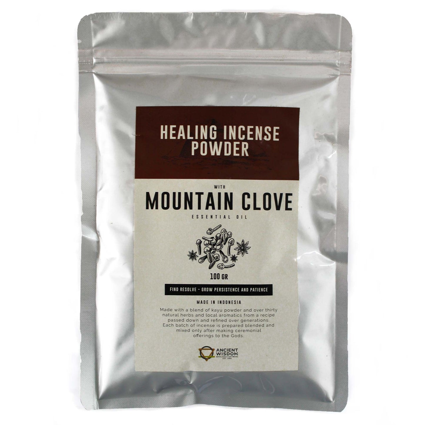 Finely ground aromatic mountain clove incense powder in a pile, showing a rich brown texture for ritual use.