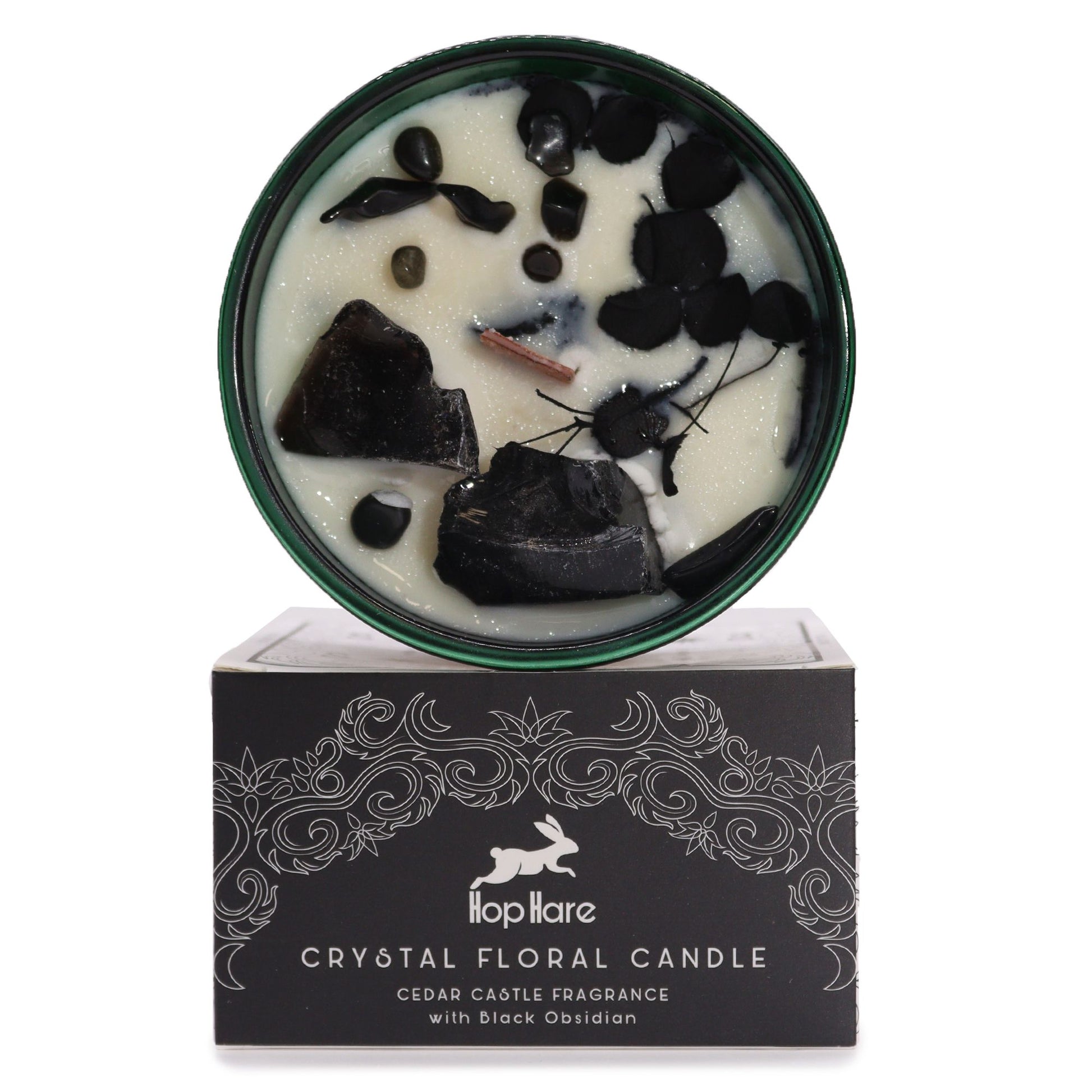 Mystical soy wax candle topped with real Black Obsidian gemstones and delicate dried flowers in a decorative tin.