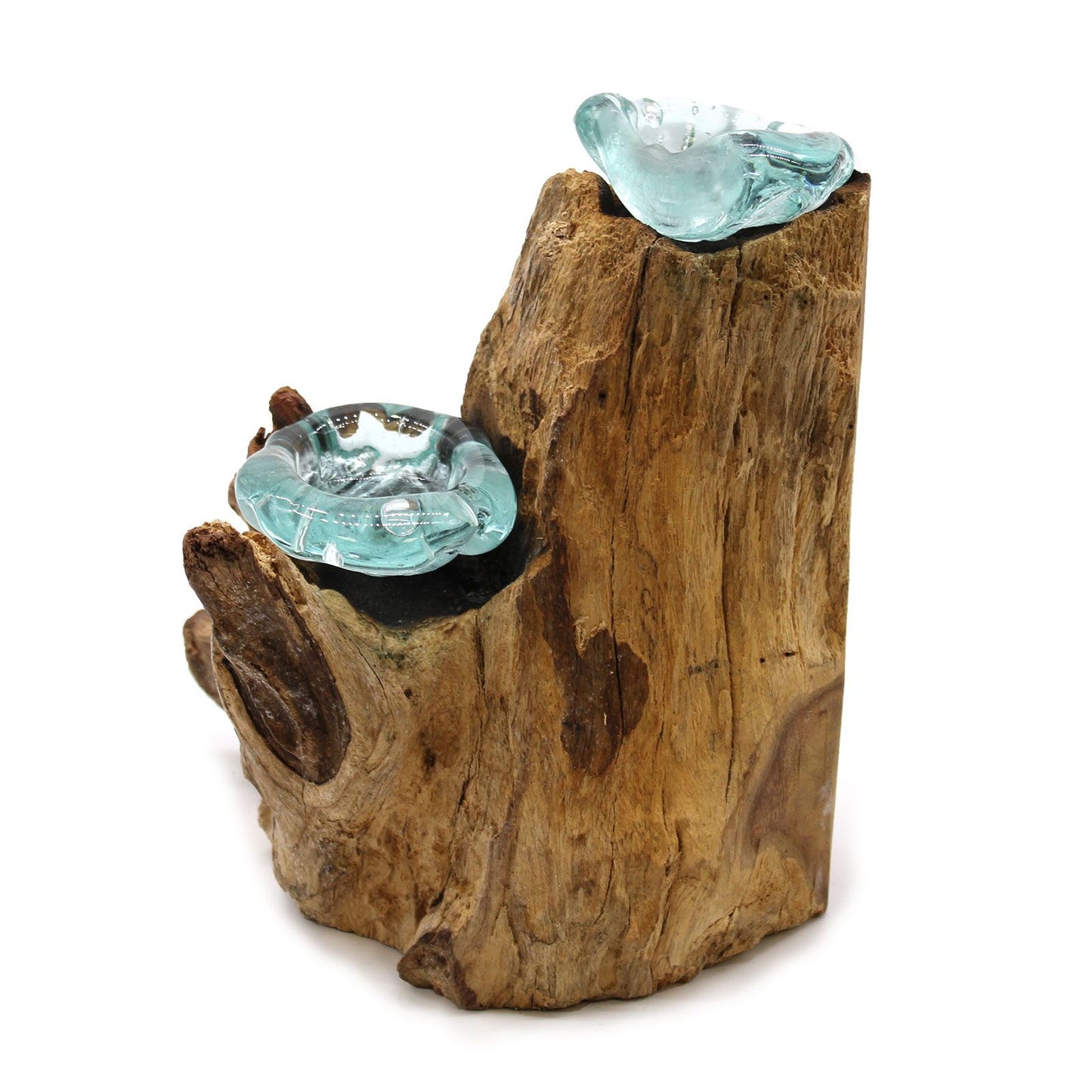 Two clear molten glass bowls hand-shaped over a natural piece of earthy gamal wood for holding candles.