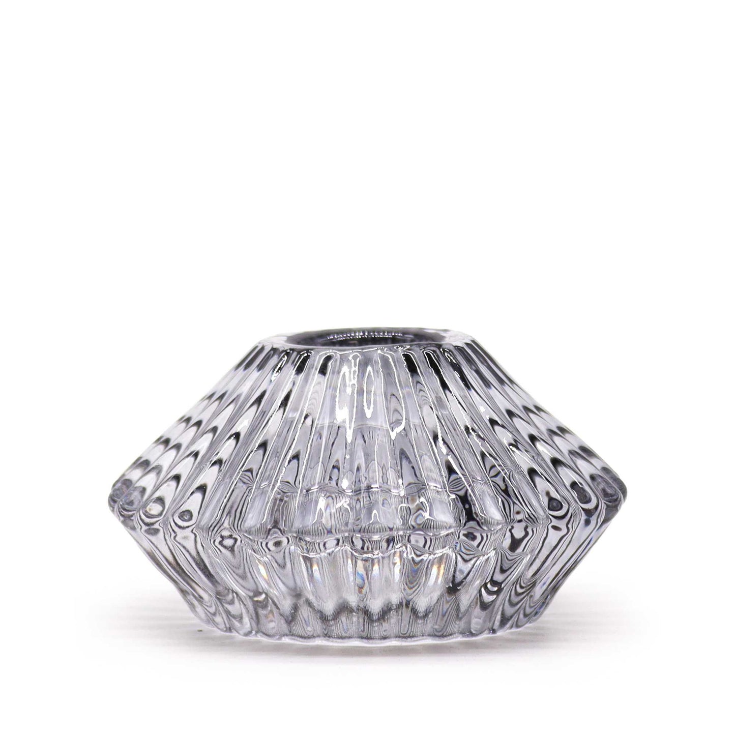 Elegant midnight grey glass flower-shaped candle holder designed to hold both dinner candles and tealights.