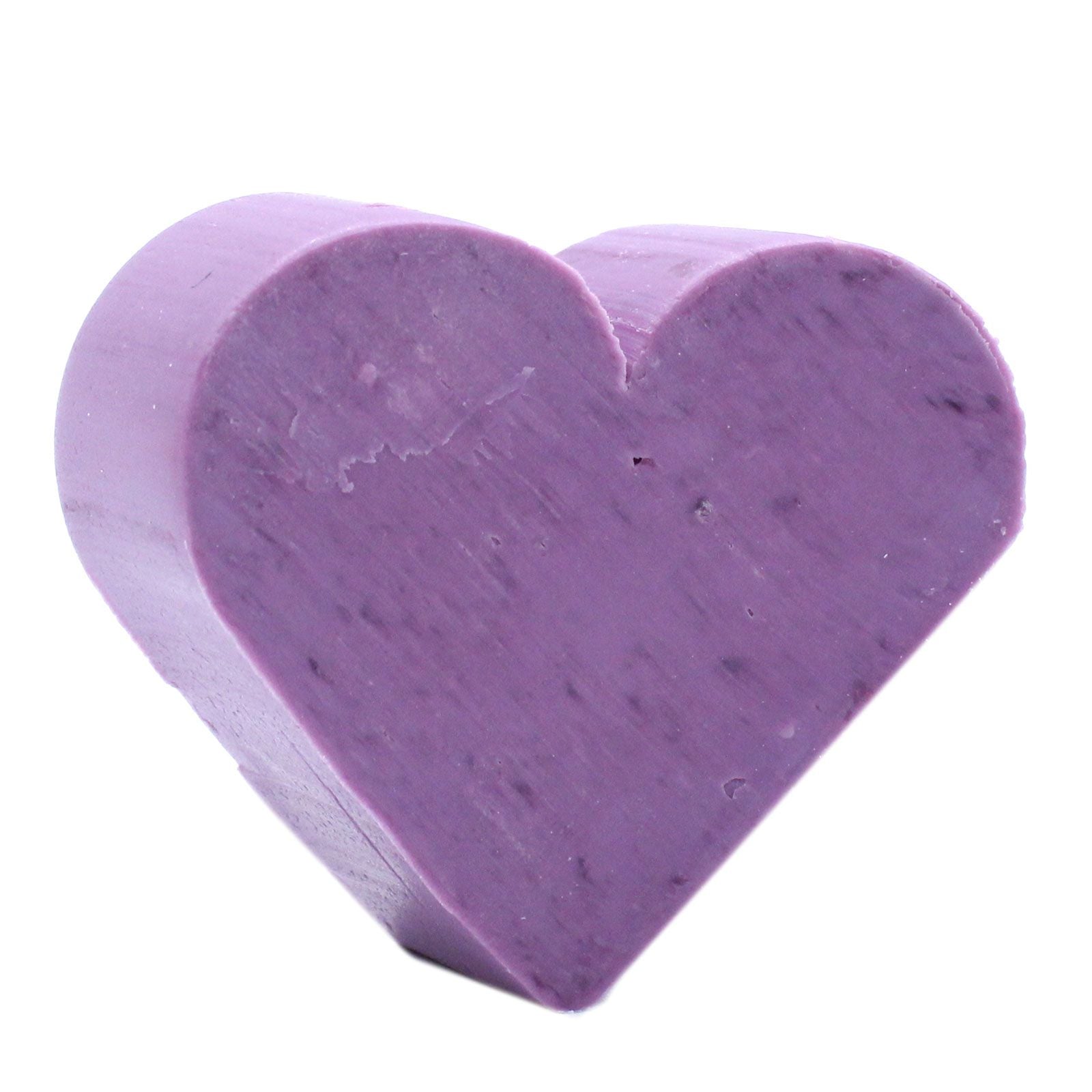 Small purple heart-shaped soaps with a smooth texture, perfect for a decorative bathroom display.