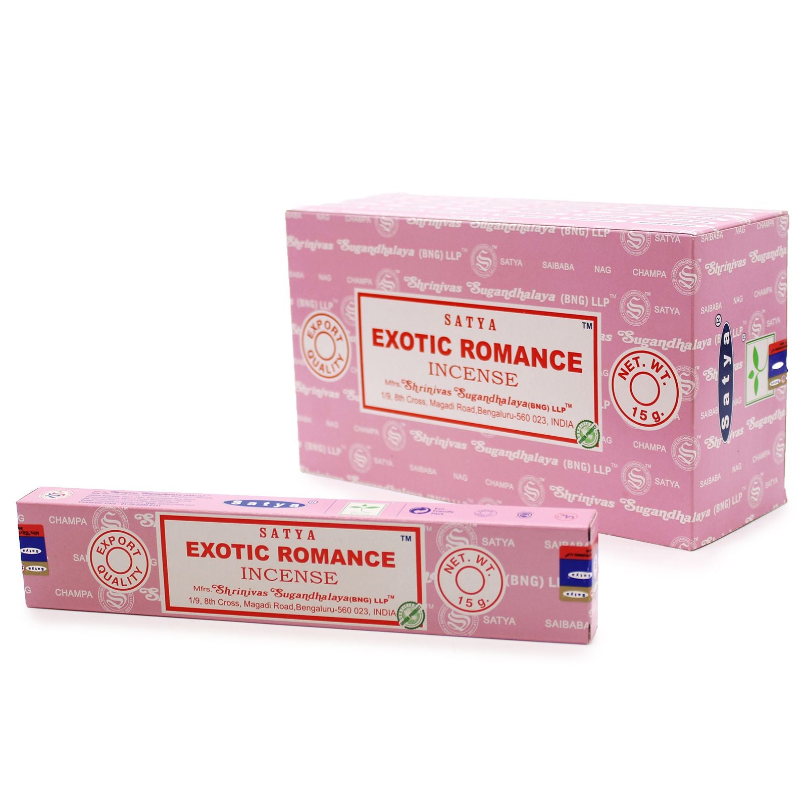 Hand-rolled incense sticks in a blue box with floral patterns on a wooden surface.