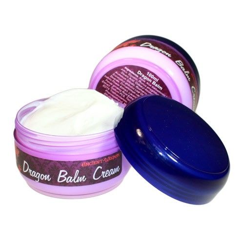 A small jar of topical pain relief cream with a white smooth texture, designed for muscle and joint application.