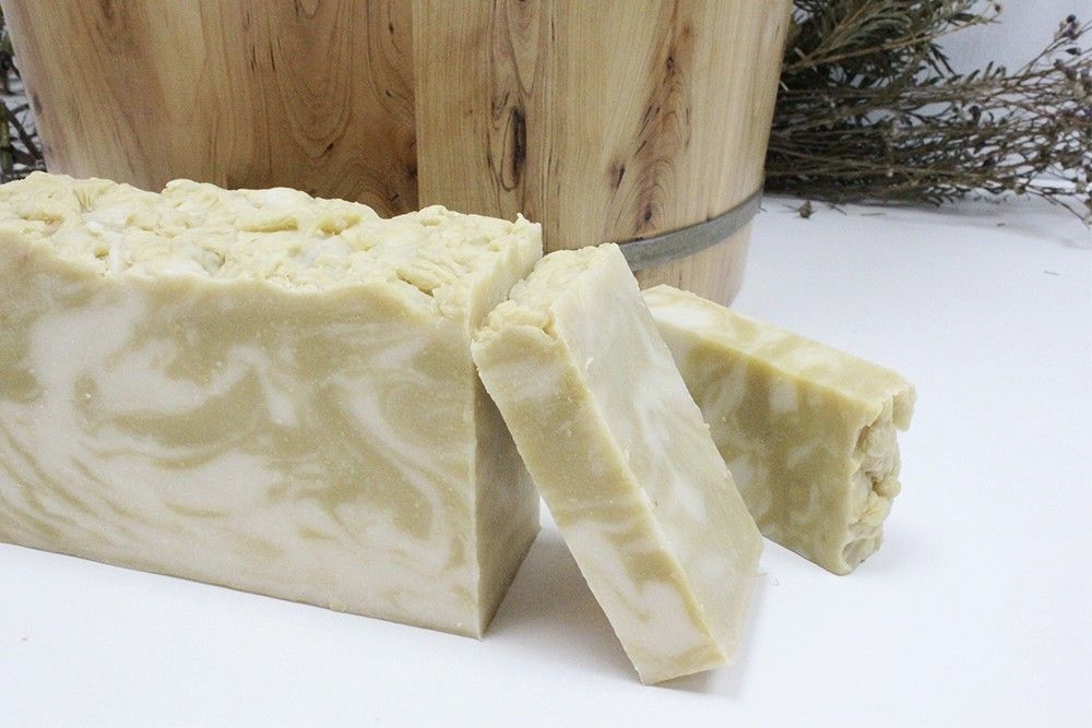 Large rectangular artisan soap loaf featuring natural argan and olive oil ingredients with a textured surface.