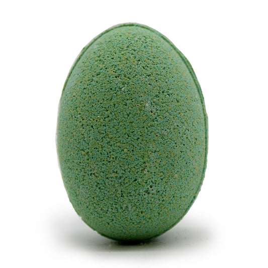 Tray of vibrant orange egg-shaped bath bombs with a smooth texture, arranged like real eggs in a cardboard carton.